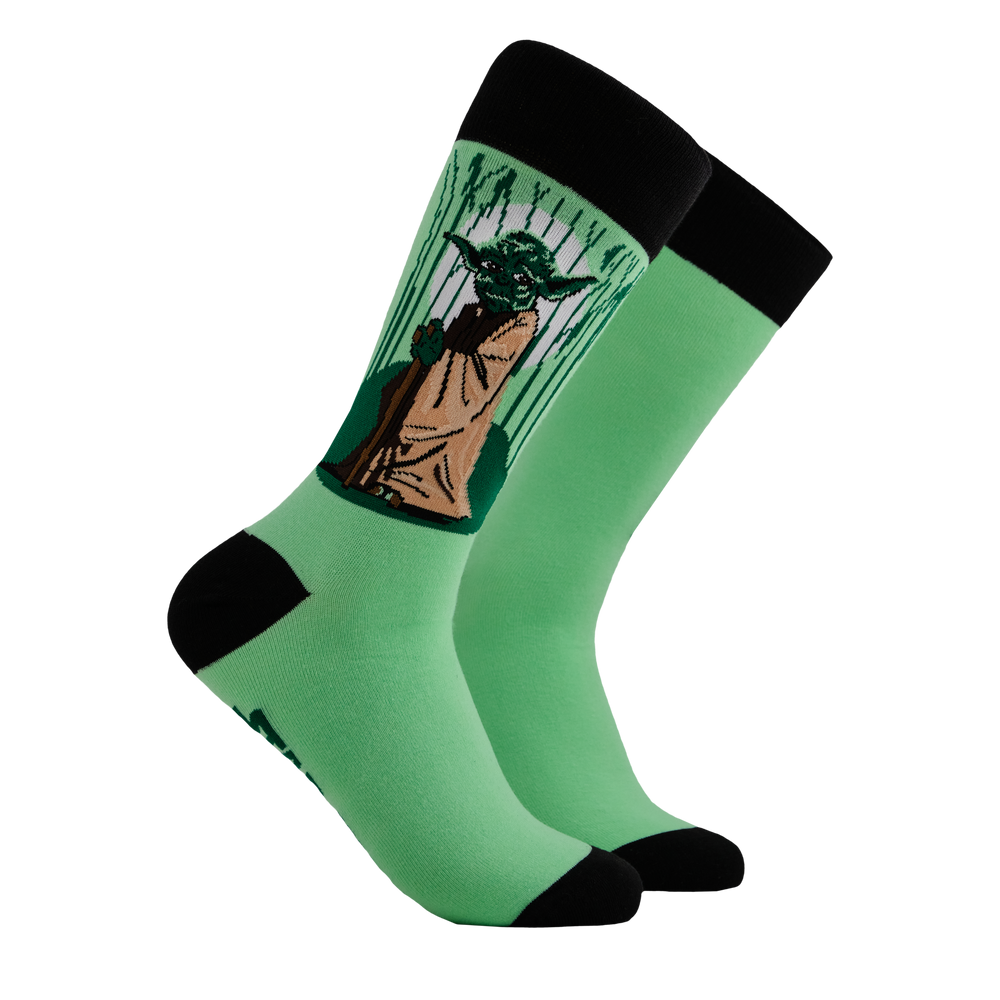 
                      
                        Star Wars Socks - Master Yoda. A pair of socks depicting Master Yoda. Green legs. Dark green cuff, toe and heel. 
                      
                    