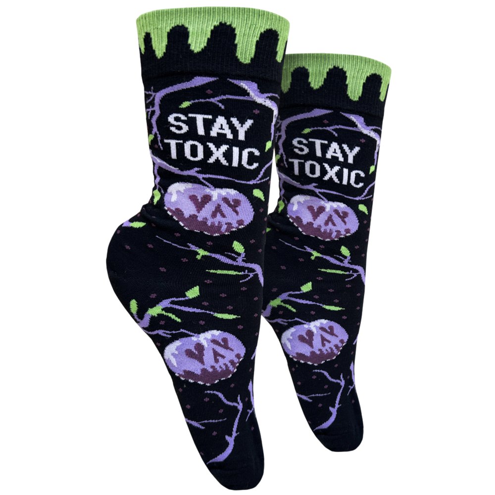 
                  
                    Stay Toxic Socks - Small. A pair of socks with a purple and green toxic waste and Halloween motif. 
                  
                