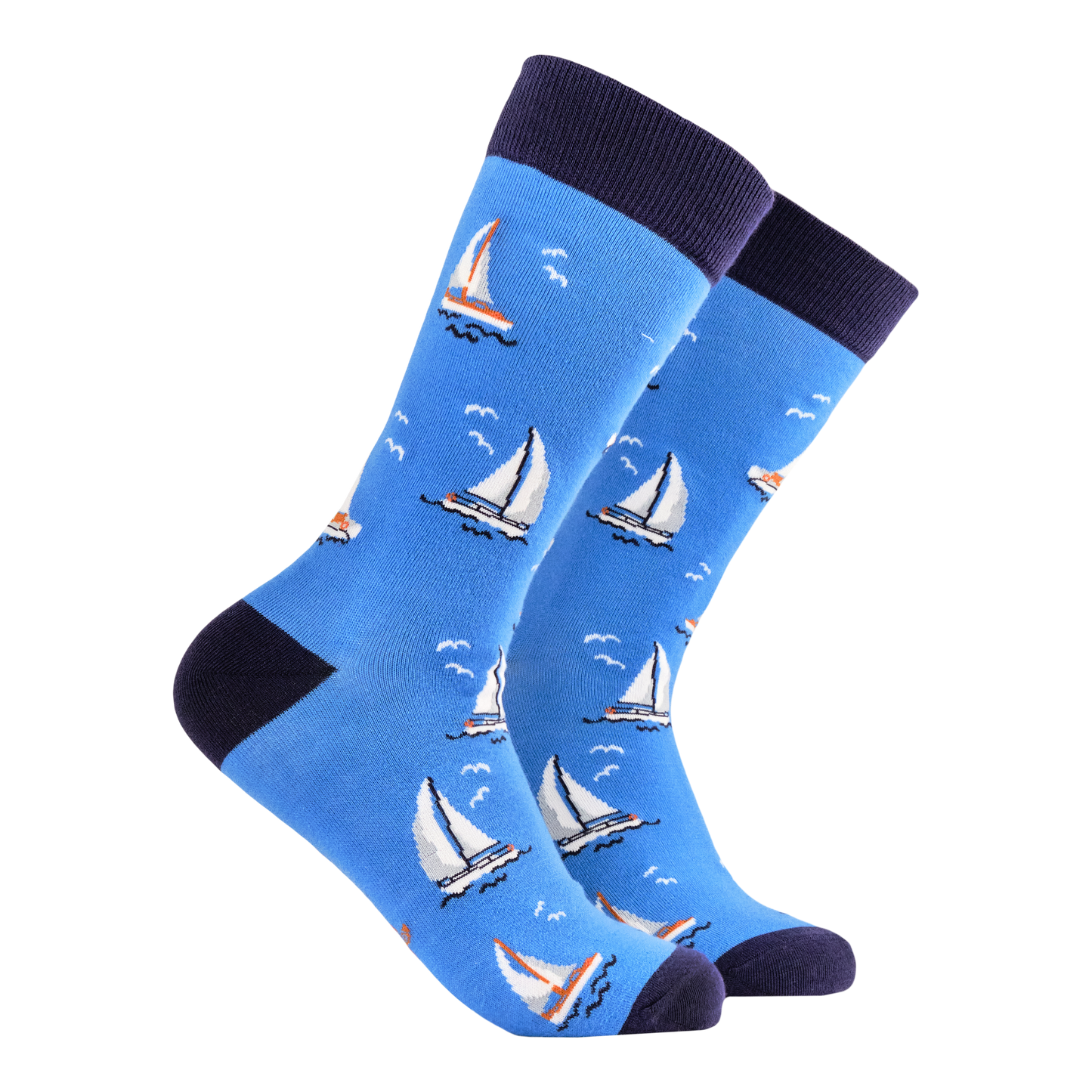 Sailing Bamboo Socks. A pair of socks featuring sail boats. Bright blue legs, dark blue heel, toe and cuff. 