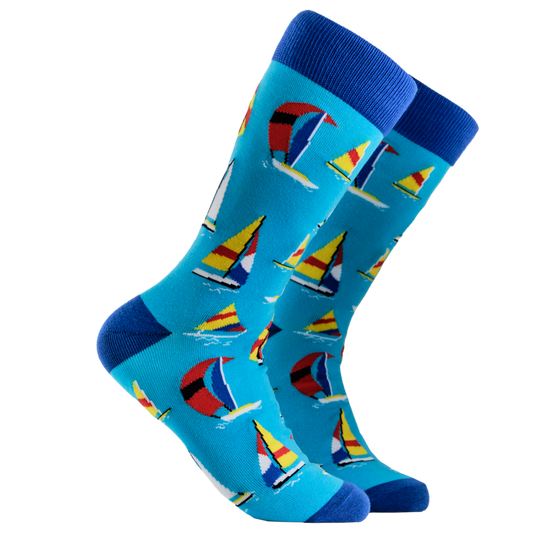 Sailboat Socks - Sailing. A pair of socks depicting sailing boats. Blue legs, dark cuff, heel and toe.