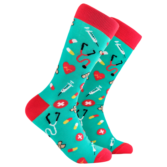 Doctor Socks - Scrubs. A pair of socks depicting medical equipment and symbols. Green legs, red cuff, heel and toe.