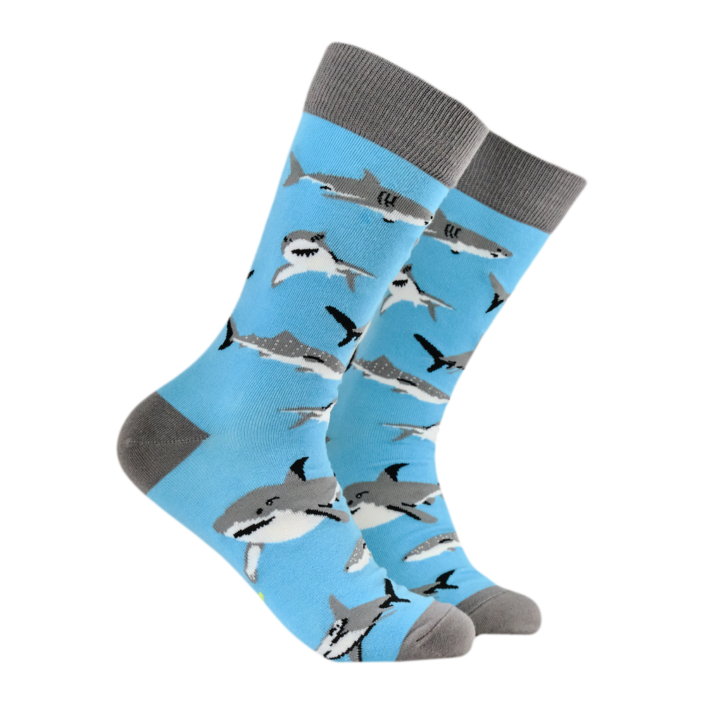 Shark Lover Bamboo Socks. A pair of socks featuring great white sharks. Light blue legs, grey heel, toe and cuff. 