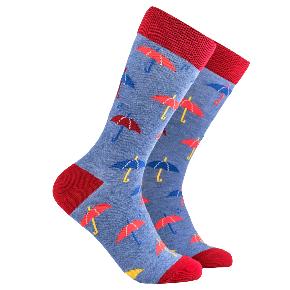 Rainy Socks - Singin' in the Rain. A pair of socks depicting red and blue umbrellas. Blue legs, red cuff, heel and toe.