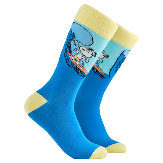 Peanuts Socks - Snoopy Surf's Up. A pair of socks depicting snoopy catching some waves. Blue legs, yellow cuff, heel and toe.