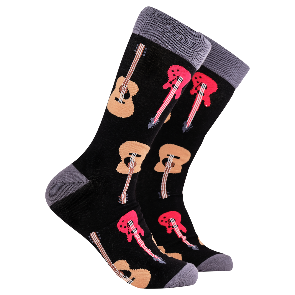 Guitar Socks - Strings Attached. A pair of socks depicting electric and acoustic guitars. Black legs, grey cuff, heel and toe.