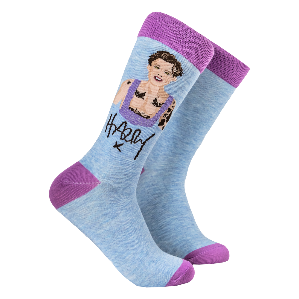 Harry Styles Socks - Stylers. A pair of socks depicting Harry Styles. Blue legs, purple toe, heel and cuff. 