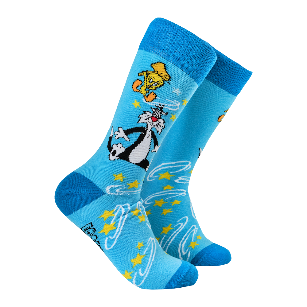 
                      
                        Looney Tunes Socks - Sylvester & Tweety. A pair of socks depicting Sylvester & Tweety. Blue legs, dark blue heel, cuff and toe. 
                      
                    