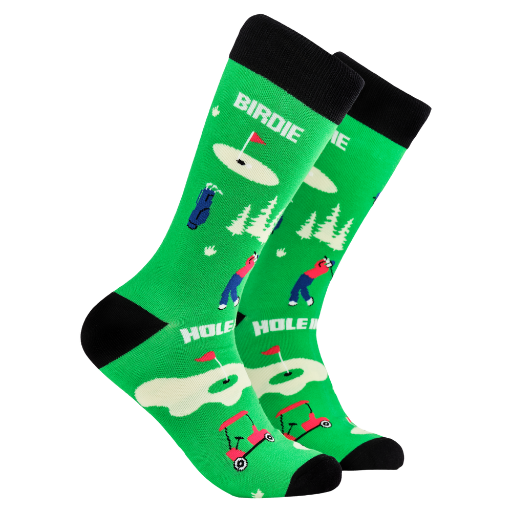 Golf Socks - Tee Caddy. A pair of socks depicting golf. Green legs, black cuff, heel and toe.