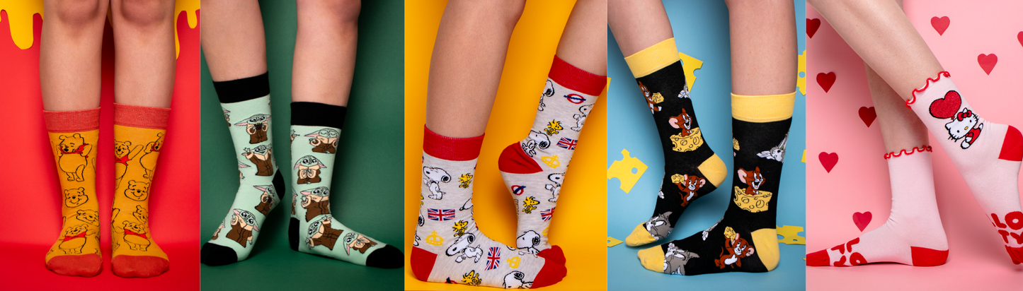 Models wearing a range of Soctopus socks. 