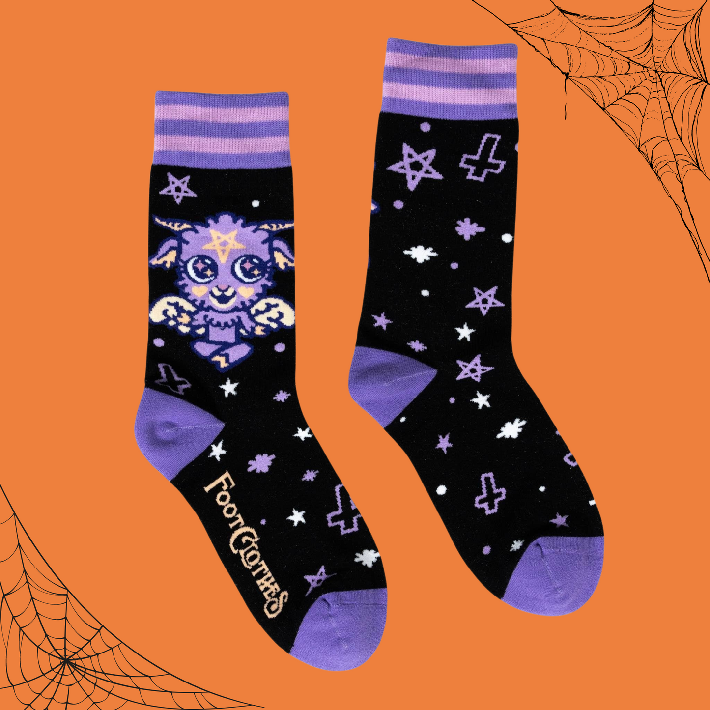 
                  
                    A pair of socks depicting a baby version of the dark lord Baphomet. Purple toe, heel and cuff. 
                  
                