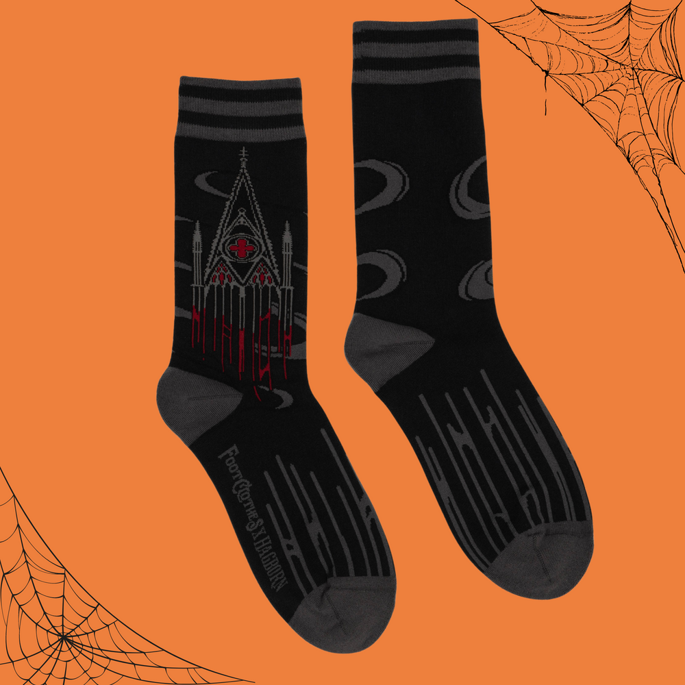 A pair of socks depicting dark gothic architecture. Black on black on black. 