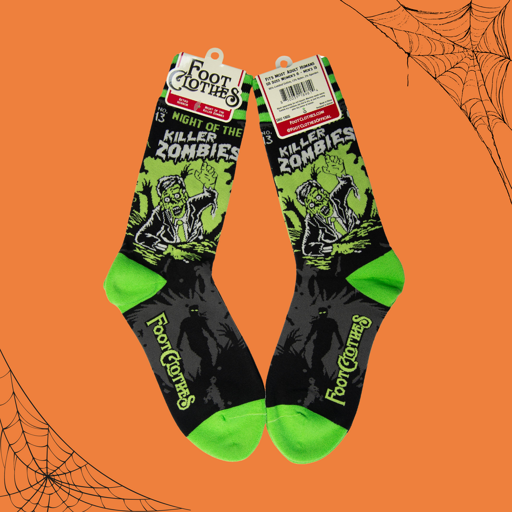 
                      
                        A pair of socks depicting classic zombie imagery. Green toe, heel and cuff. 
                      
                    