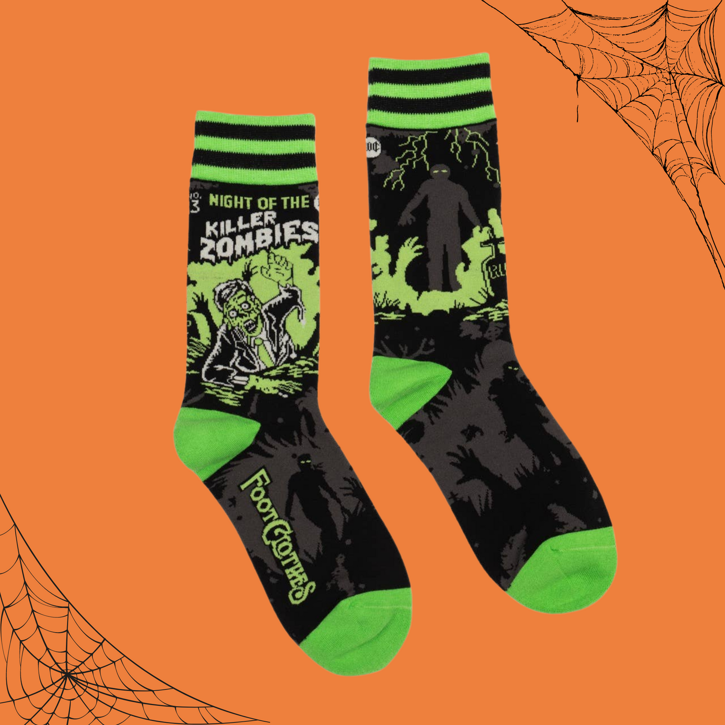 
                  
                    A pair of socks depicting classic zombie imagery. Green toe, heel and cuff. 
                  
                