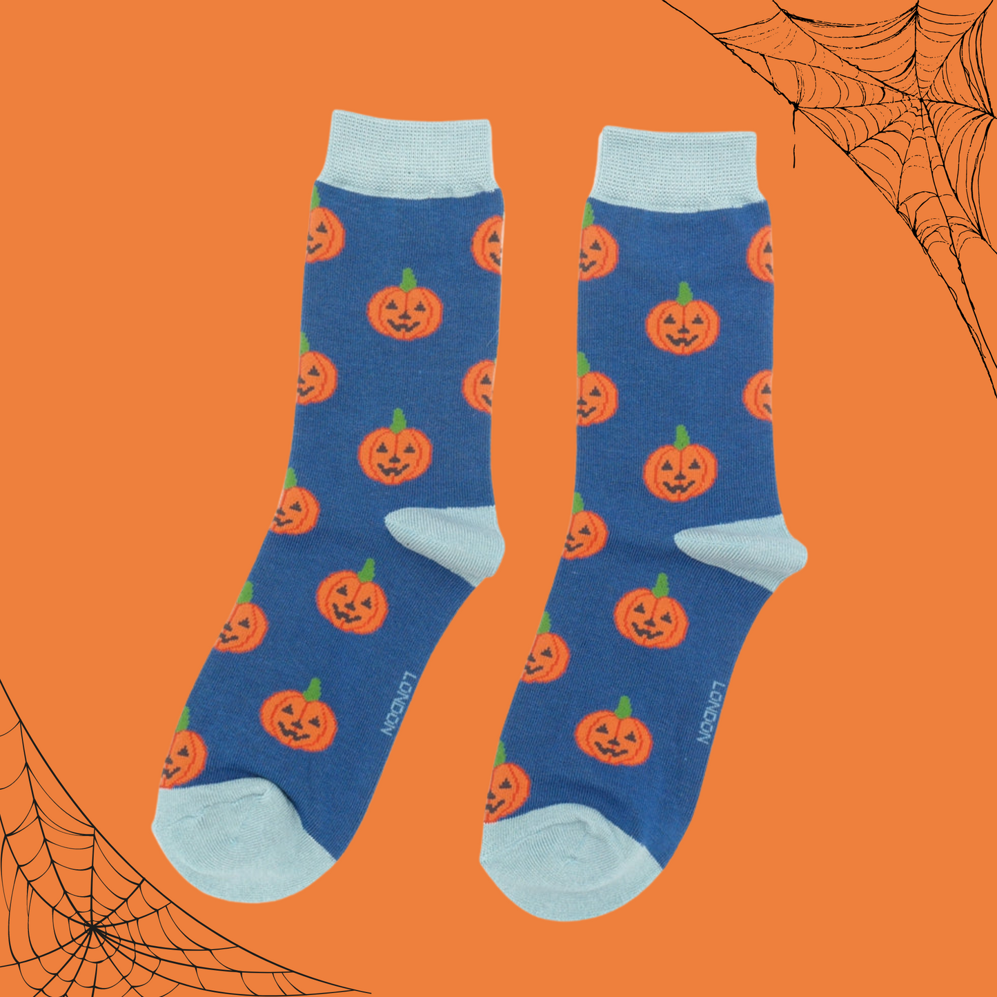 A pair of socks with a happy halloween pumpkin motif. 