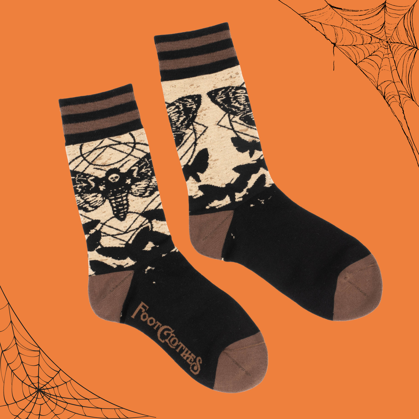 
                  
                    A pair of socks depicting a deaths head moth. Brown toes, heel and cuff. 
                  
                