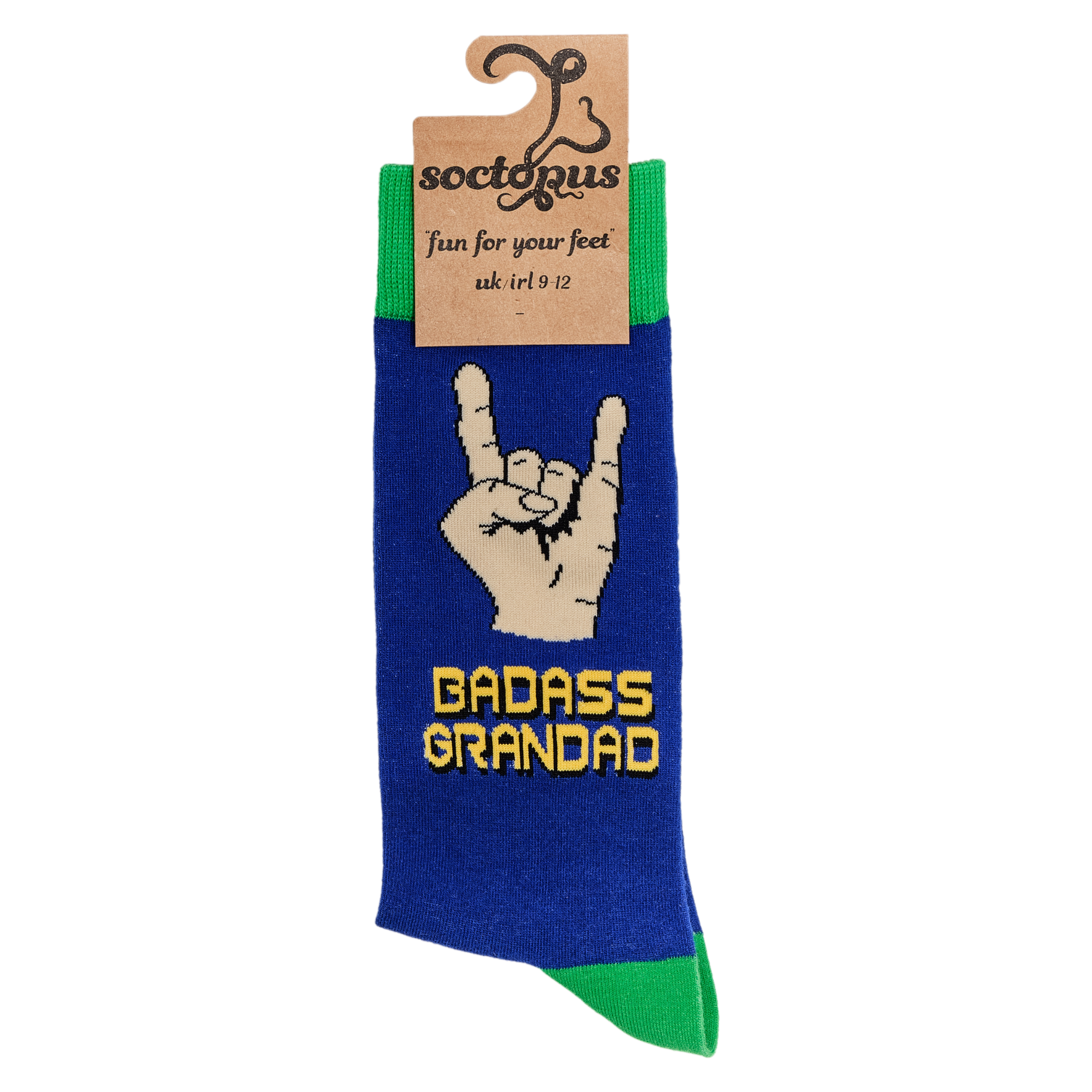 A pair of socks depicting metal horns that say 'Badass Grandad. Blue legs, green cuff, heel and toe. In packaging.
