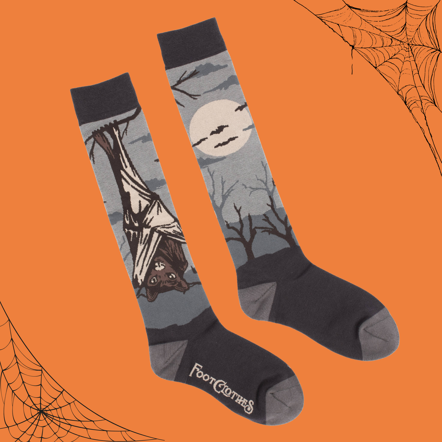 
                  
                    A pair of socks depicting a spooky vampire bat. Knee high for comfort. Grey toe, heel and cuff. 
                  
                