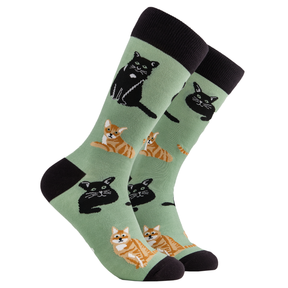 Cat Lover 2 Socks. A pair of socks depicting cats. Green legs, black cuff, heel and toe.