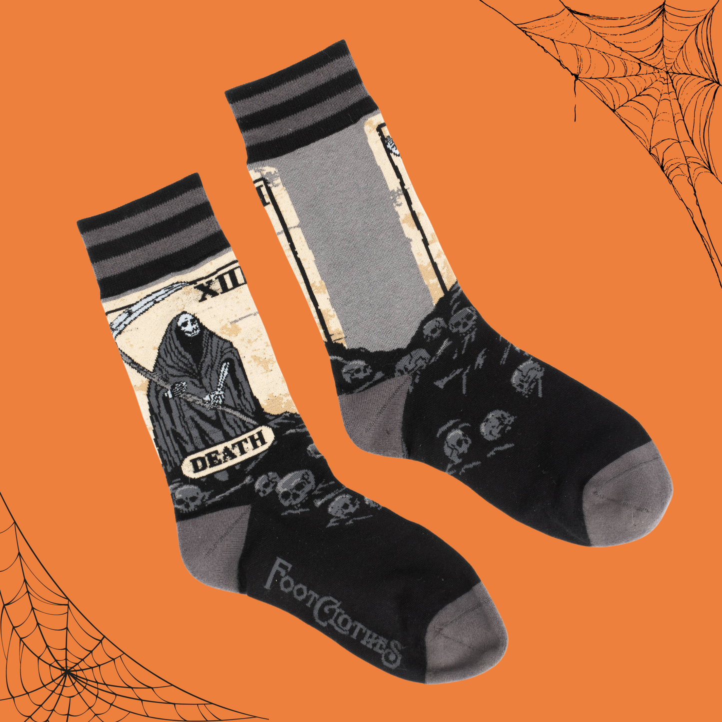 A pair of socks depicting the death tarot card. Grey toe, heel and cuff. 