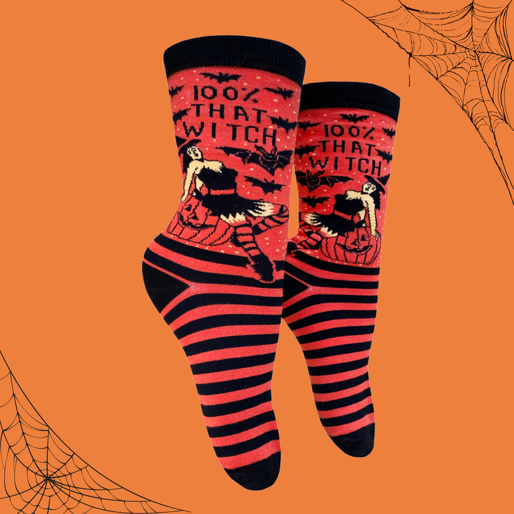 A pair of red and black, striped socks featuring a hot witch. Black toes, heel and cuff. 