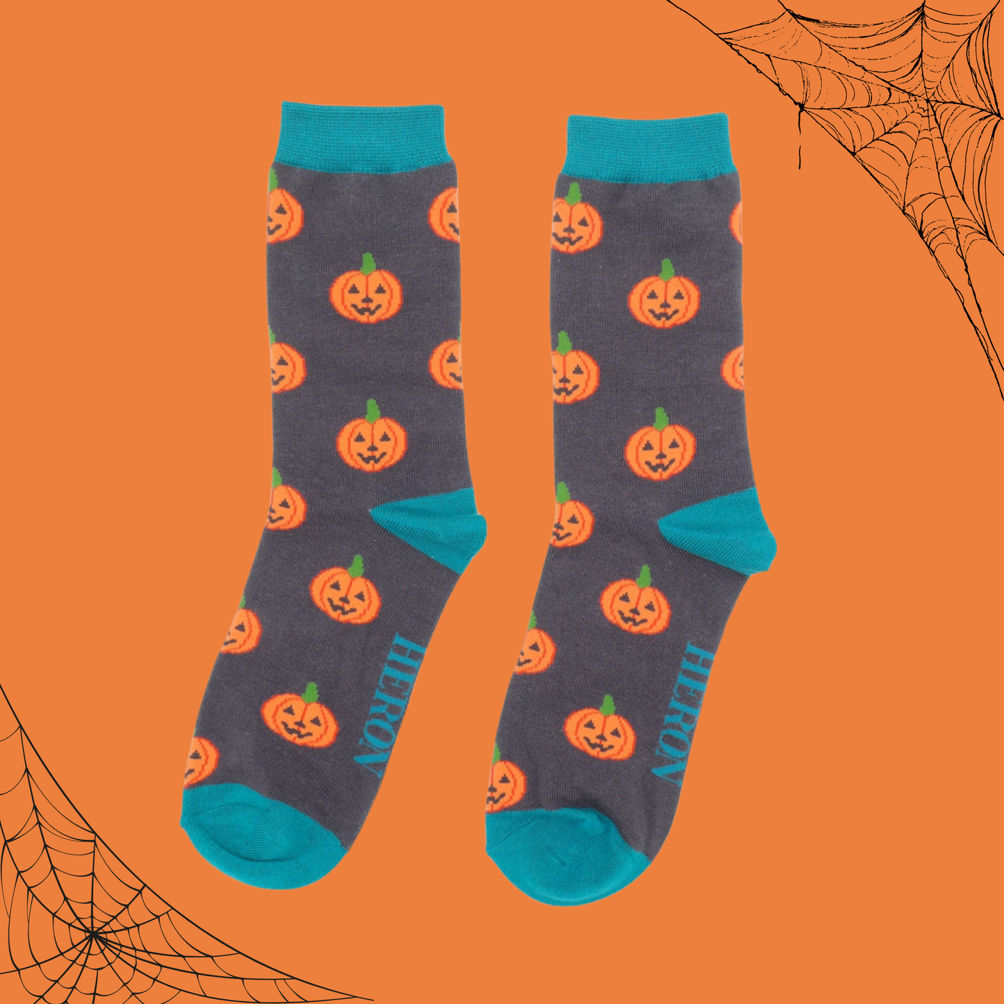 
                  
                    A pair of socks with a happy halloween pumpkin motif. 
                  
                