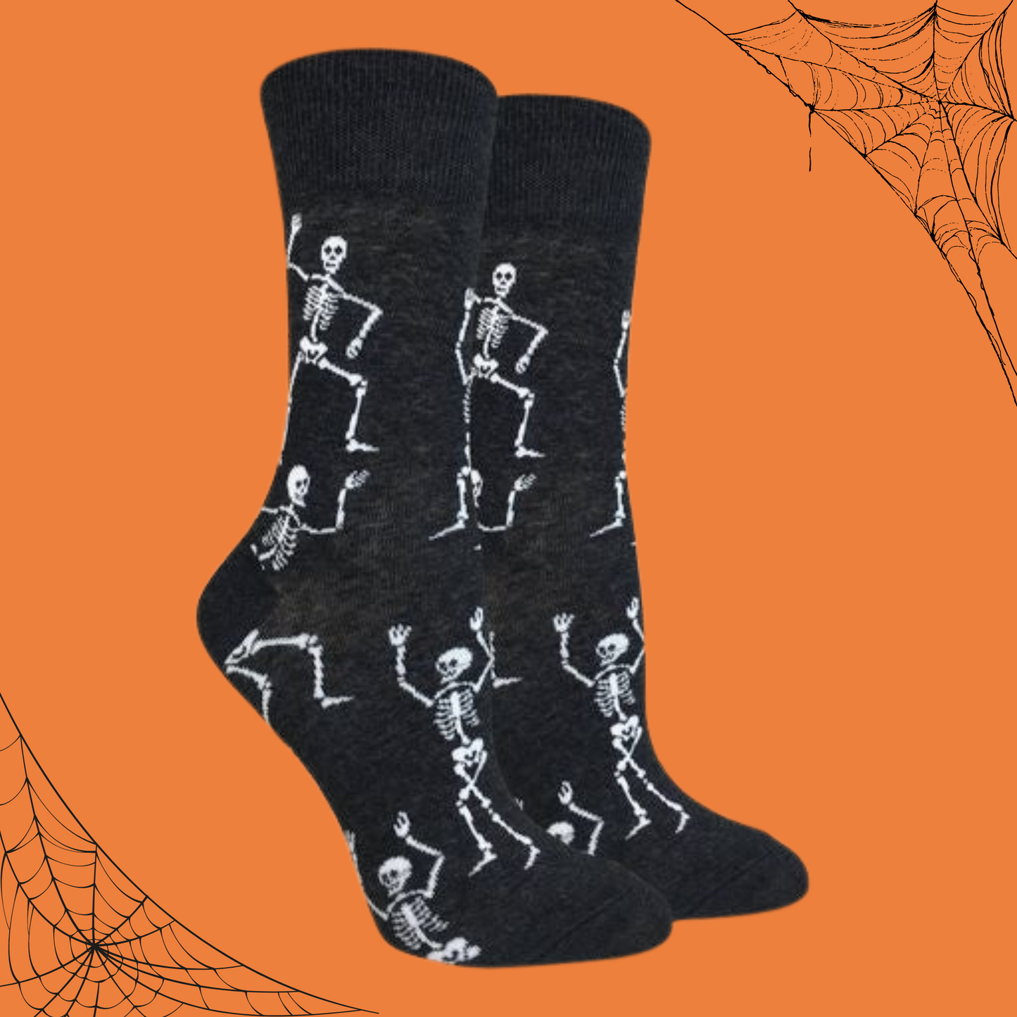 
                  
                    A pair of socks depicting dancing skeletons. Black leg, cuff, heel and toe. 
                  
                