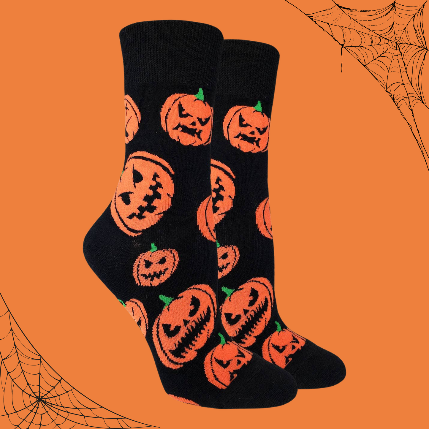 A pair of socks depicting the classic jack-o-lantern.  Black toes, heel and cuffs. 