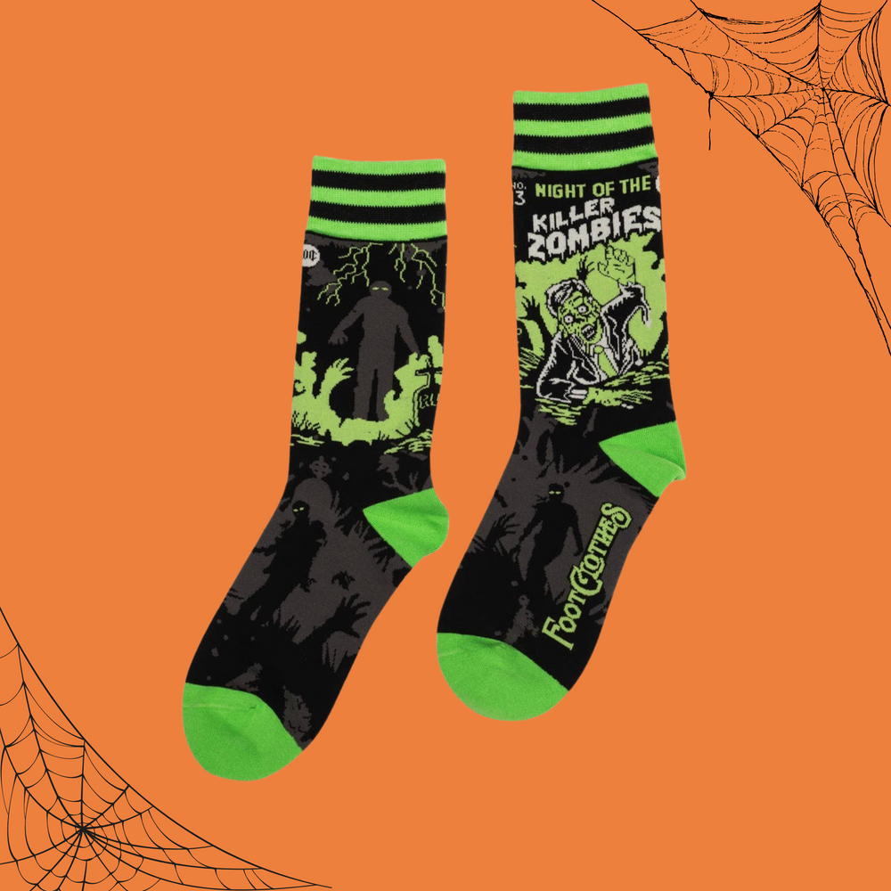 
                      
                        A pair of socks depicting classic zombie imagery. Green toe, heel and cuff. 
                      
                    