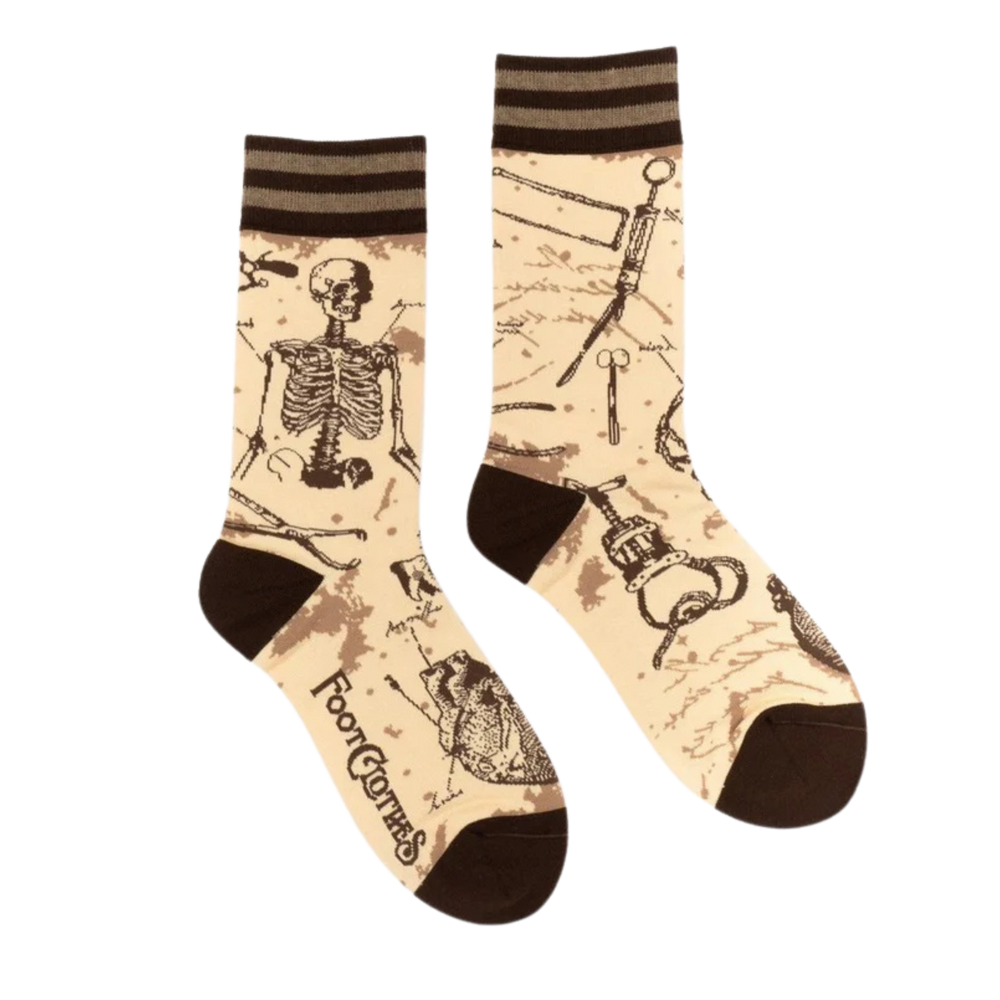 
                      
                        Antique Medical Crew Socks. A pair of socks featuring antique medical pictures. Cream legs, brown heel, toe and cuff. 
                      
                    