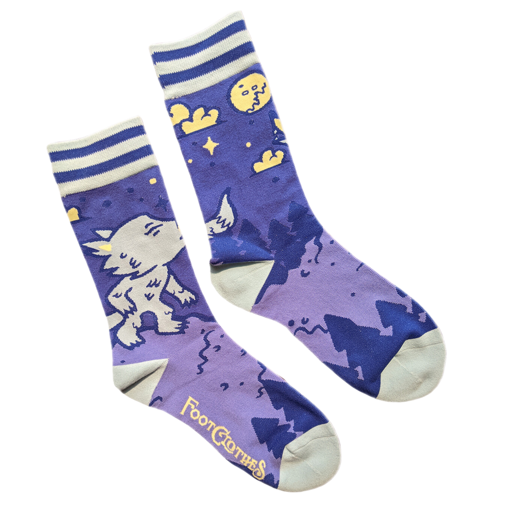 Cute Werewolf Socks. A pair of socks with a cool cute werewolf motif. Cream toes, heel and cuff. 