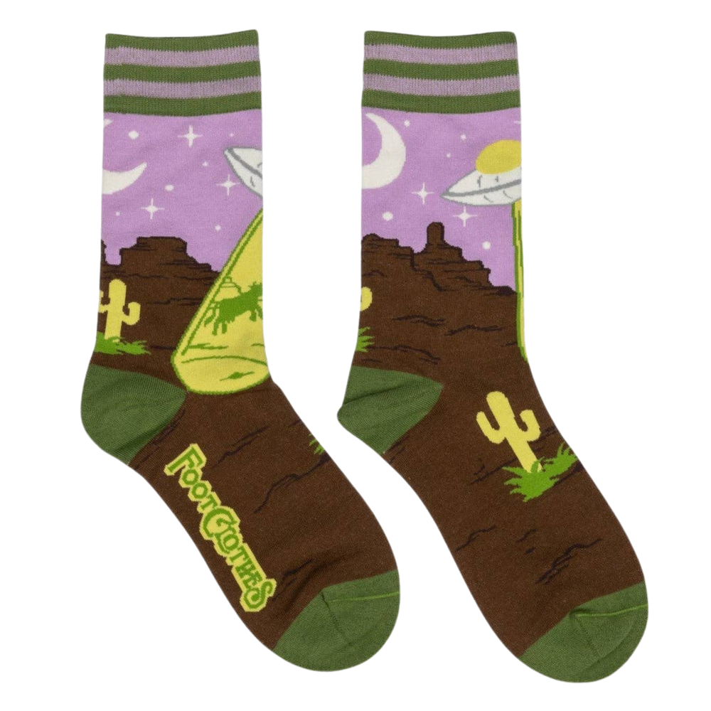 
                      
                        Home on the Strange Socks. A pair of socks featuring a UFO and a very confused cow. Brown legs, green heel, toe and cuff. 
                      
                    