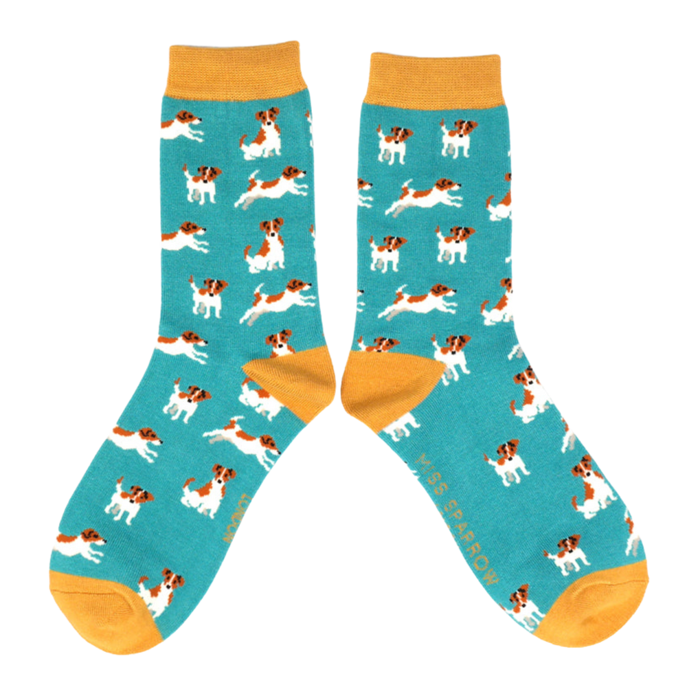 
                      
                        A pair of socks featuring a jack russell motif. Teal legs, orange heel, toe and cuff. 
                      
                    