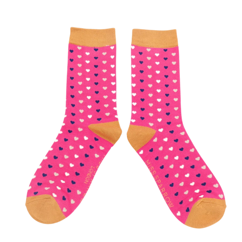 Hearts Bamboo Socks. A pair of bamboo socks with a heart pattern Pink legs, orange toe, heel and cuff. 