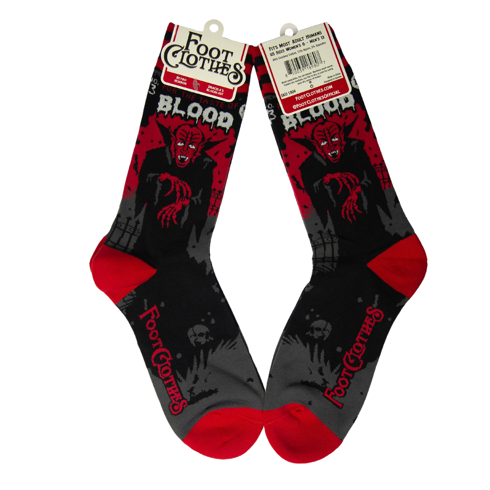 
                      
                        A pair of socks depicting Dracula and a vampire slogan. Red cuff, heel and toe.
                      
                    