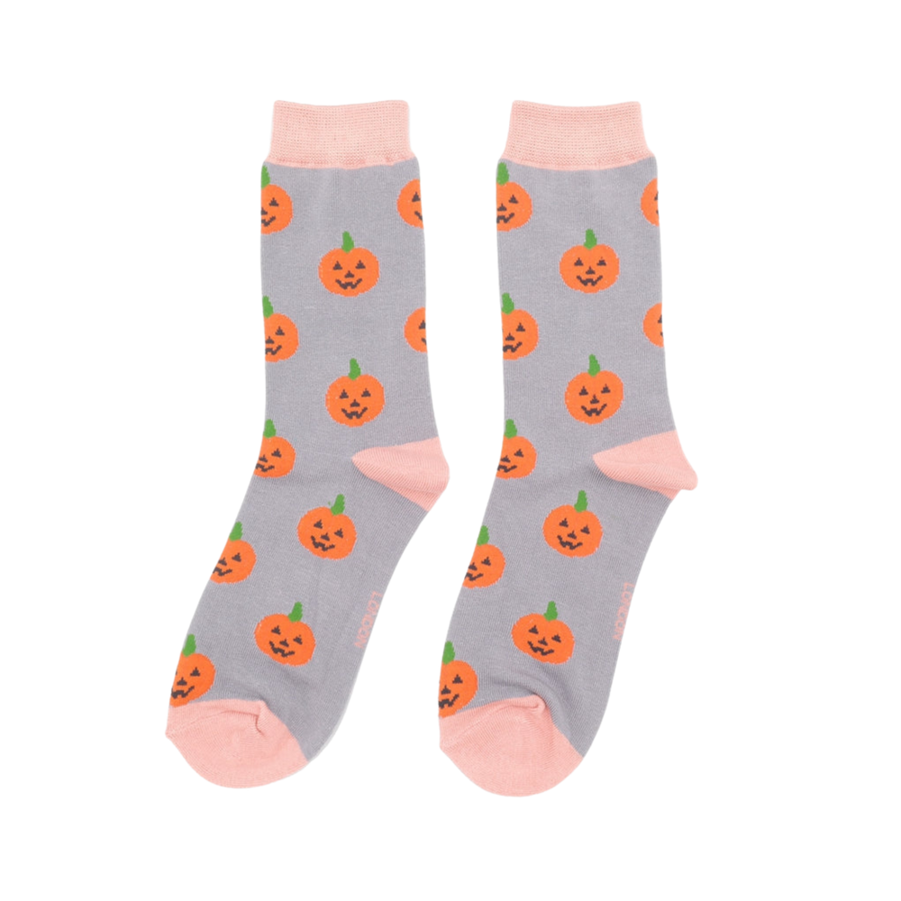 
                      
                        A pair of socks with a happy halloween pumpkin motif. 
                      
                    