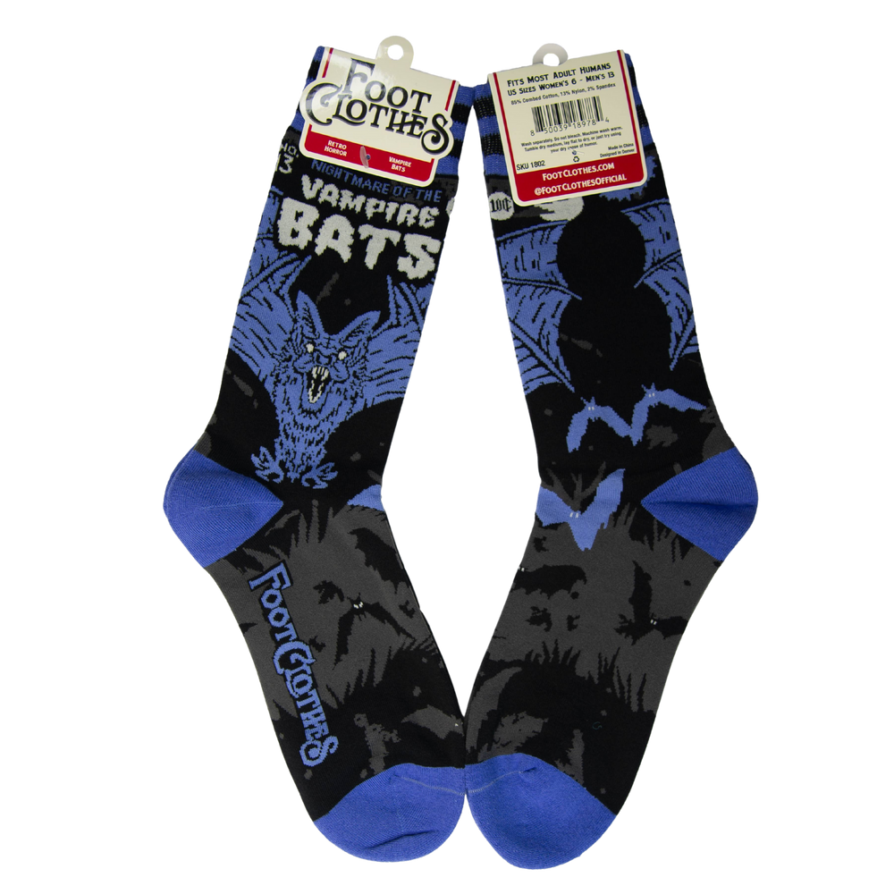 
                      
                        A pair of socks depicting a scary looking vampire bat. Blue toes, cuff and heel. 
                      
                    