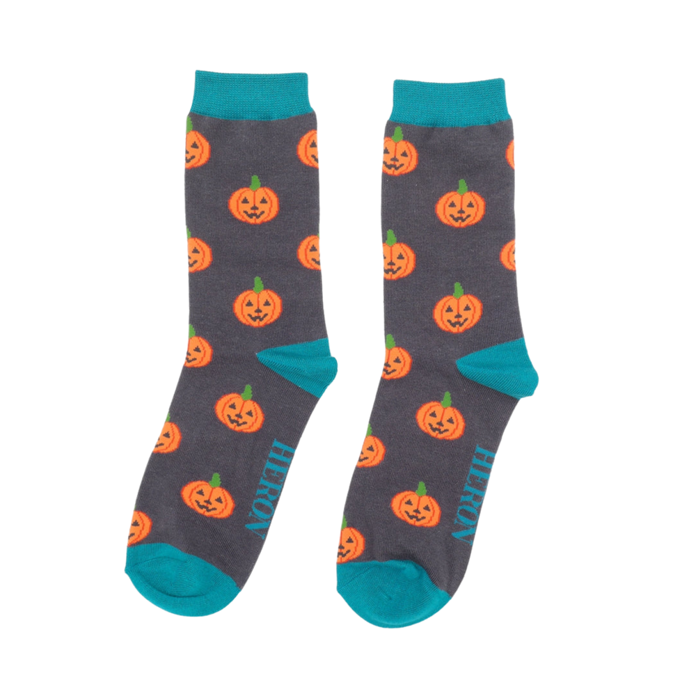 
                      
                        A pair of socks with a happy halloween pumpkin motif. 
                      
                    