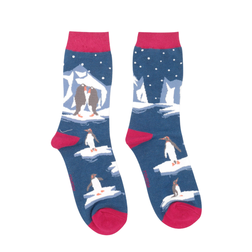 
                      
                        A pair of socks depicting penguins on ice. Blue legs. Red toes, heel and cuff. 
                      
                    