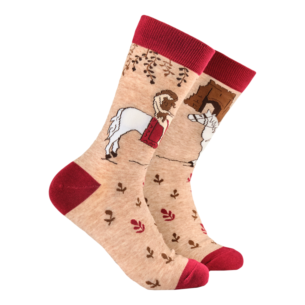 Lady Godiva Socks. A pair of socks featuring Lady Godiva. Beige legs, red heel, toe and cuff. 