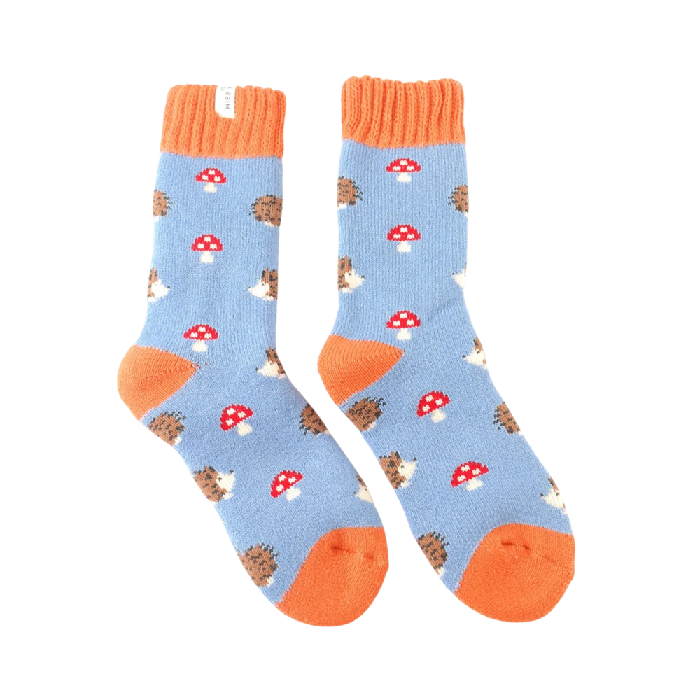 Winter Hedgehogs & Toadstools Socks - Miss Sparrow. A pair of socks with a hedgehog and toadstool motif. Blue legs. Orange cuff, toe and heel. 