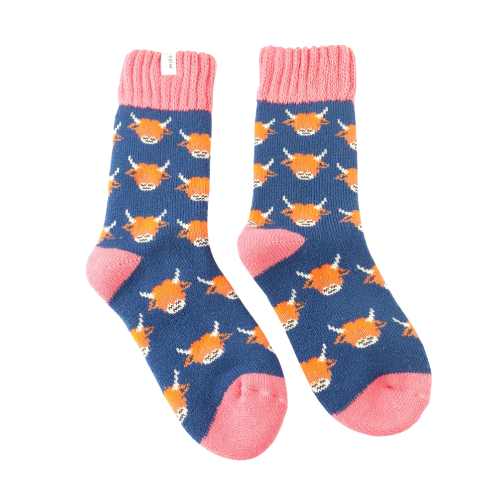 
                      
                        A pair of socks depicting highland cows. blue legs, pink heel, toe and cuff. 
                      
                    