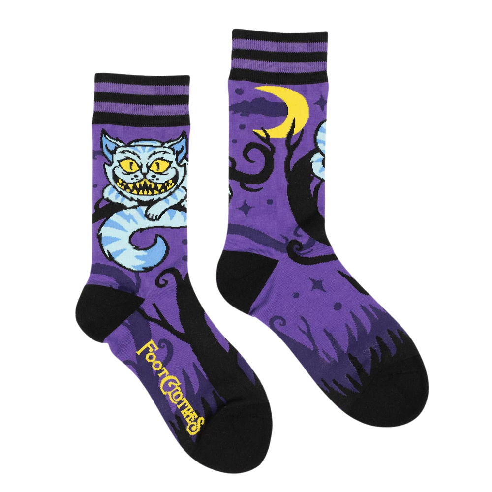 
                      
                        Cheshire Cat Socks. A pair of socks featuring the cheshire cat. Purple legs, black heel, cuff and toe. 
                      
                    