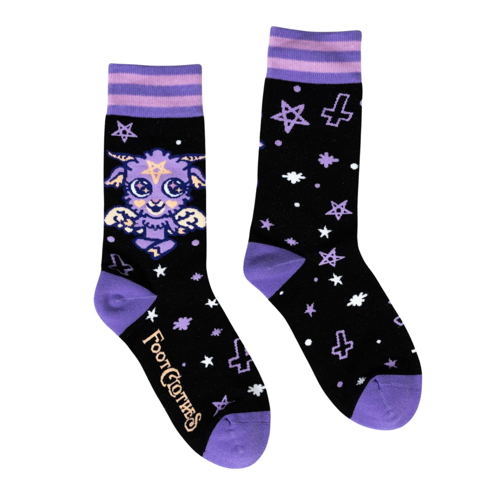 
                      
                        Baby Baphomet Socks. A pair of socks depicting a baby version of the dark lord Baphomet. Purple toe, heel and cuff. 
                      
                    