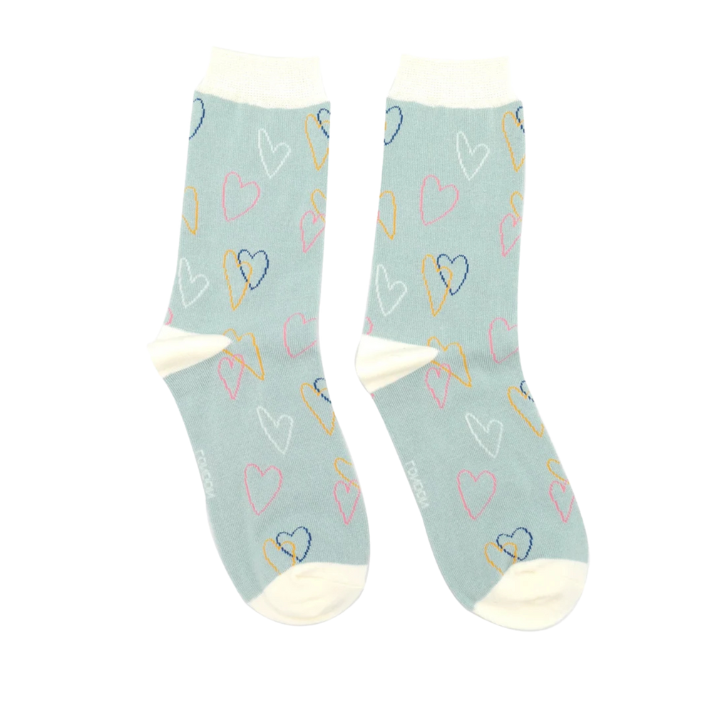 
                      
                        A pair of socks with a heart pattern. Grey legs, yellow heel toe and cuff. 
                      
                    