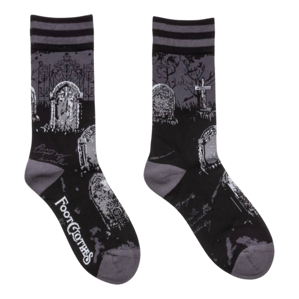 
                      
                        Garden of the Dead Crew Socks. A pair of socks featuring a cemetery motif. Black legs, grey heel, toe and cuff. 
                      
                    