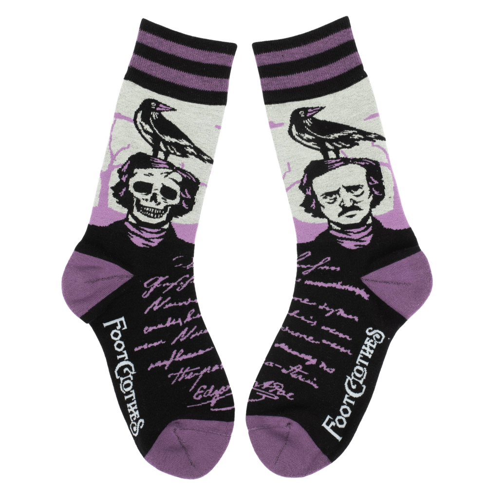 
                      
                        A pair of socks depicting a skeleton Edgar Allan Poe with a raven. Purple toes, heel and cuff. 
                      
                    