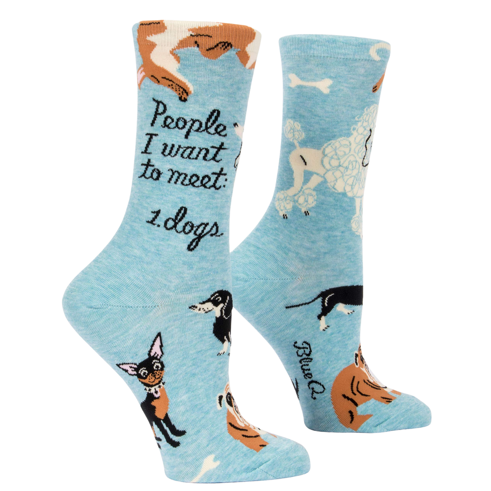 People I Want to Meet: Dogs Socks. A pair of socks featuring playful dogs. Blue legs, heel, toe and cuff. 