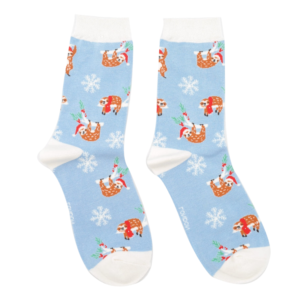 
                      
                        A pair of socks depicting xmas sloths wearing santa hats. Blue legs, white heel, toe and cuff. 
                      
                    