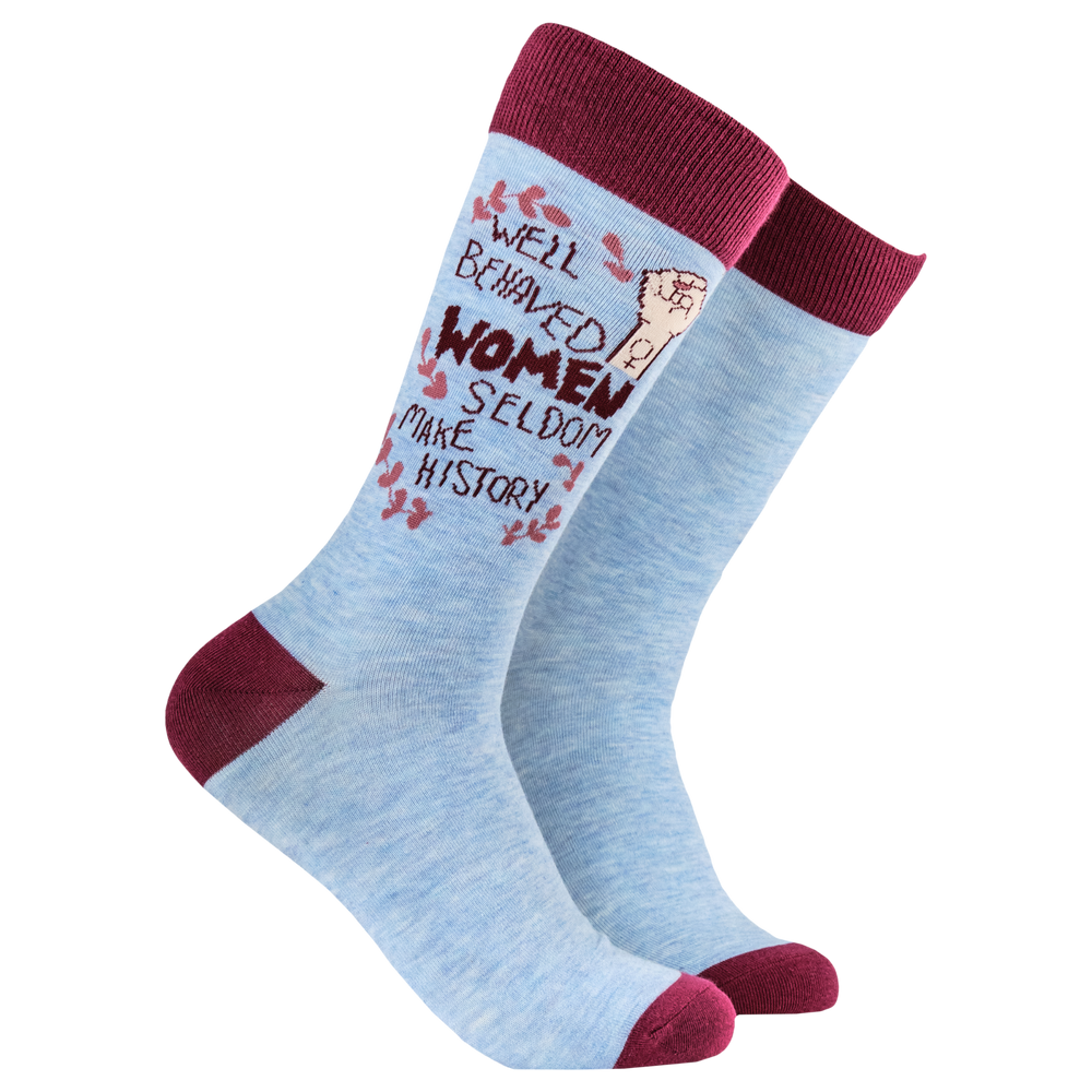 Feminist Socks - Well Behaved Women. A pair of socks with a feminist slogan. Blue legs, claret heel, toe and cuff. 