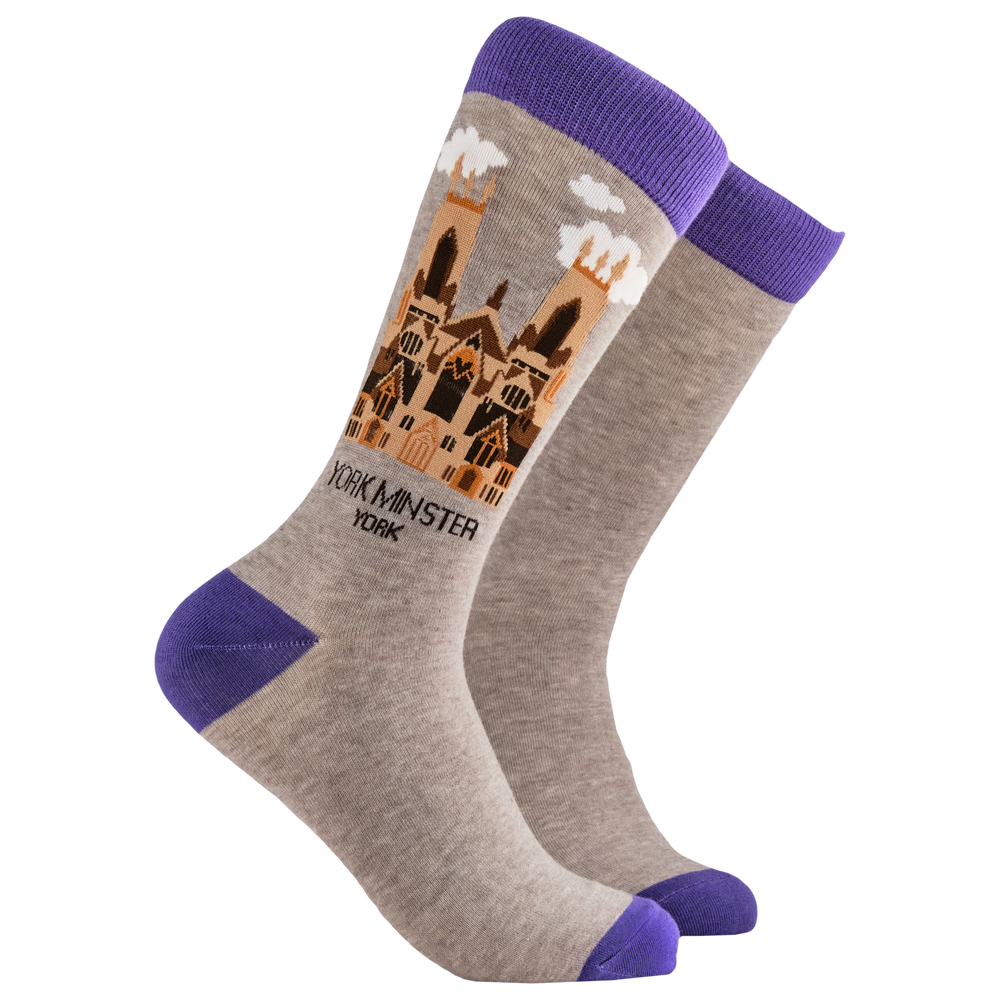 York Minster Socks. A pair of socks depicting the iconic York Minster cathedral. Grey legs, purple cuff, toe and heel. 